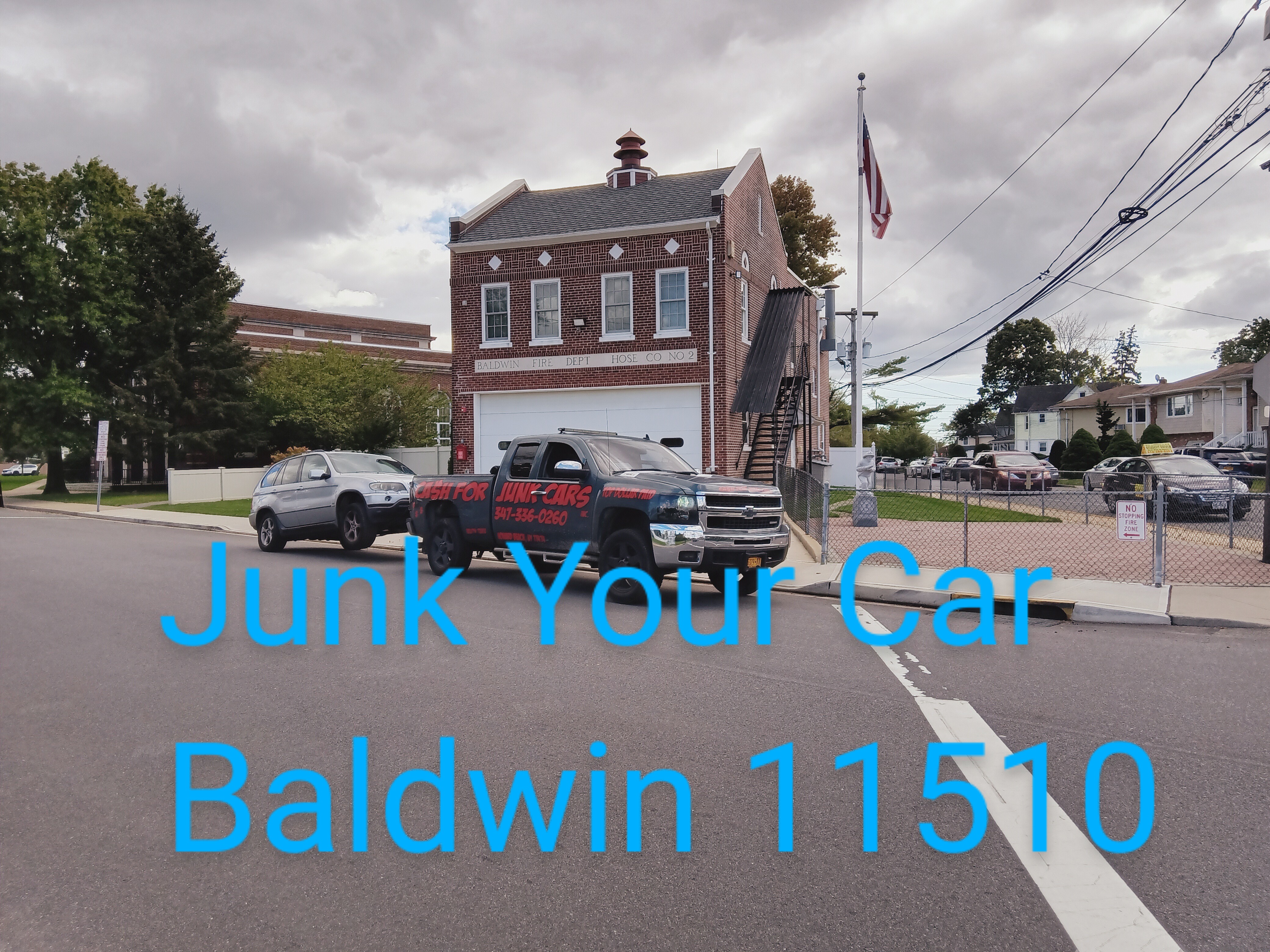 our truck towing a vehicle past the Baldwin fire department house, on church street in Baldwin, long island