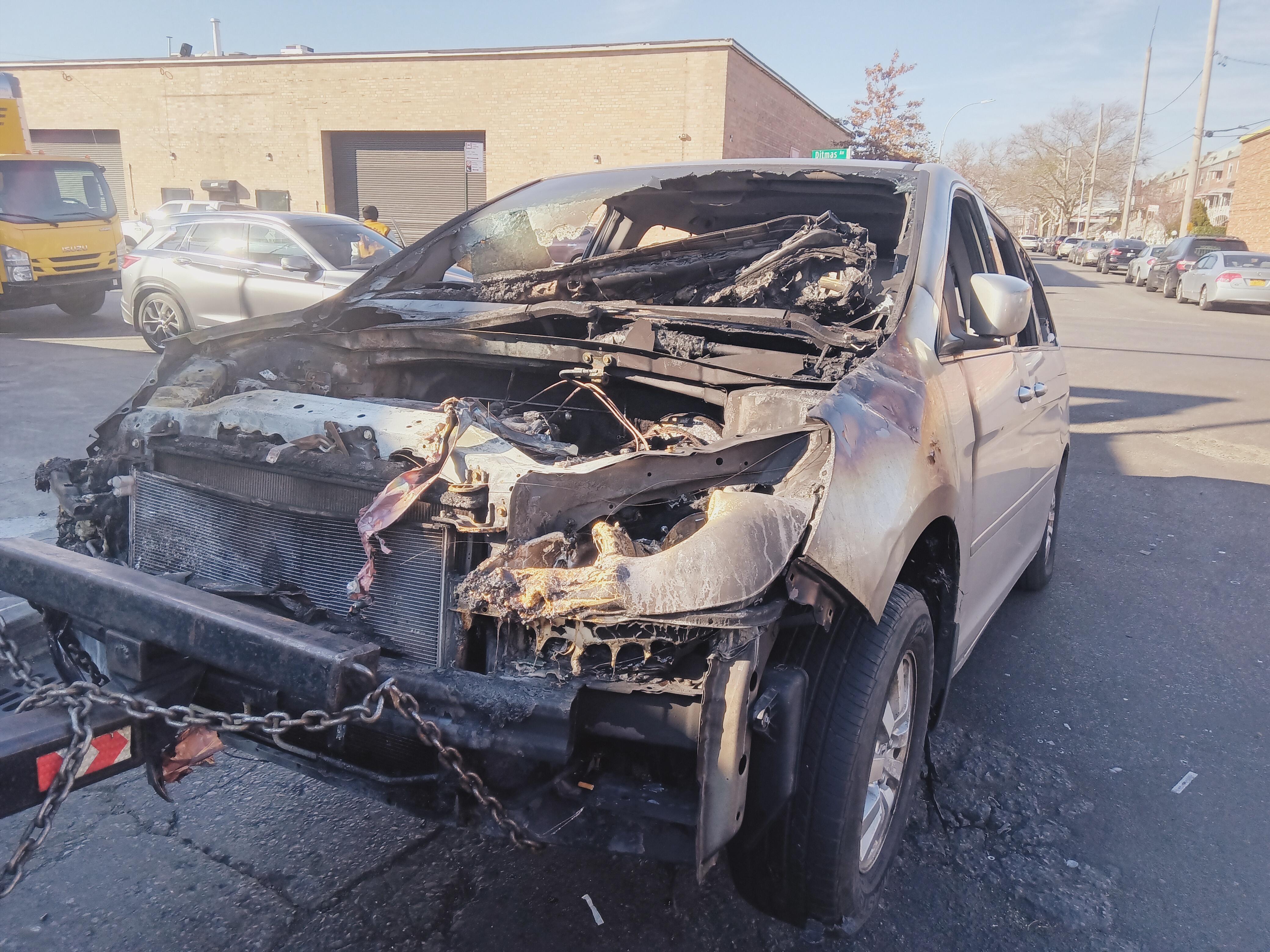 vehicle severely fire damaged with missing parts