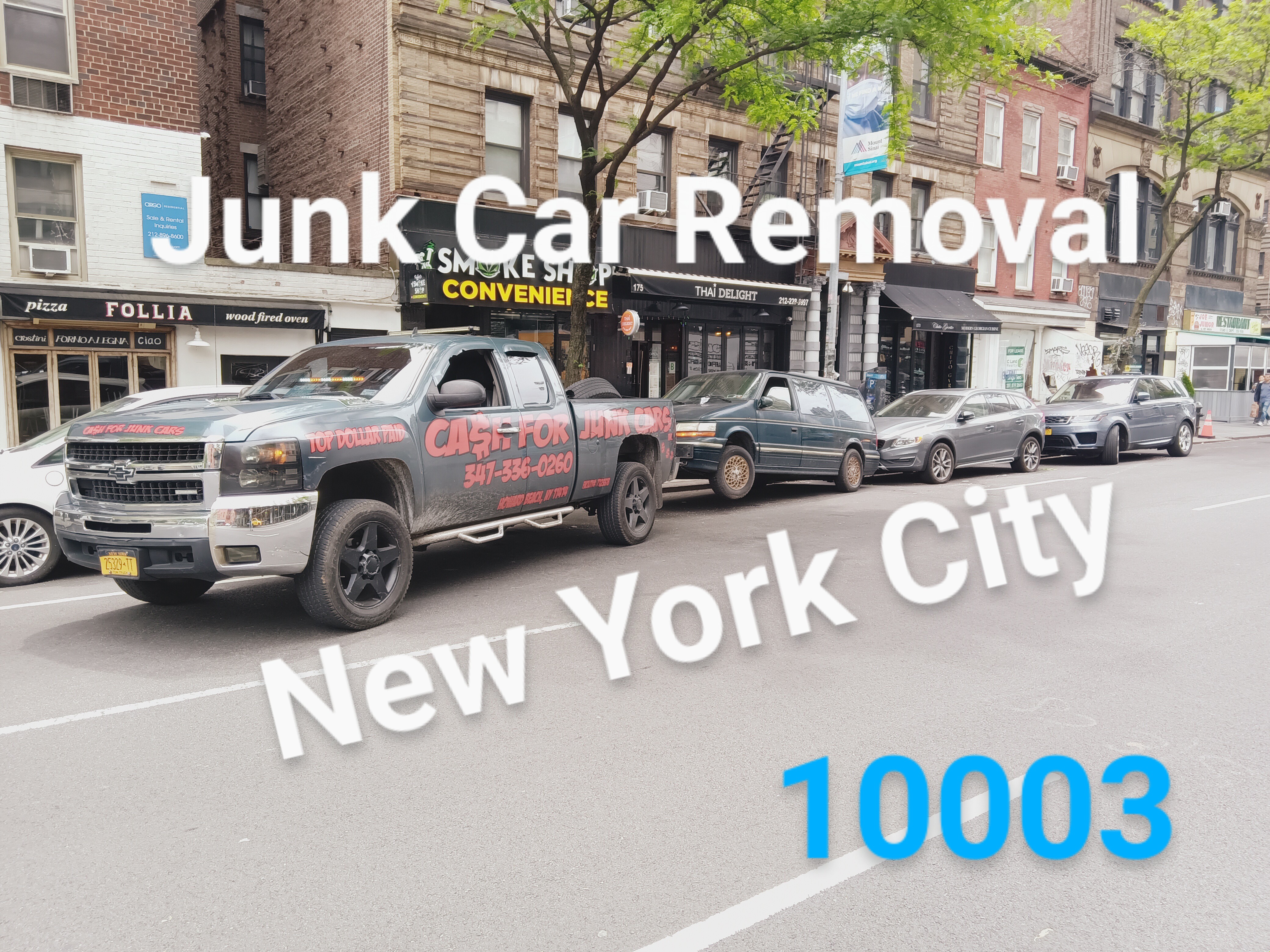 our truck working on 3rd ave NYC, 10003 removing a customer's vehicle 
